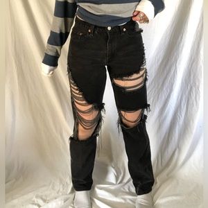 Black hand distressed Levi’s